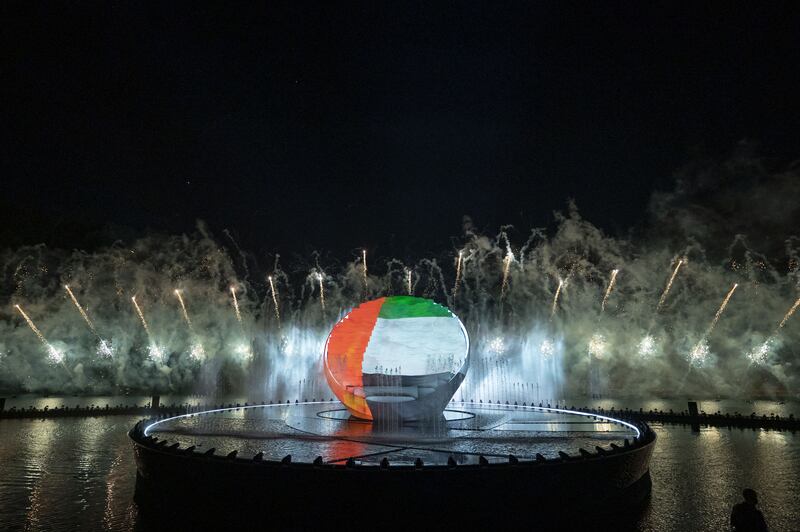 The UAE flag is illuminated in Hatta. Photo: Ministry of Presidential Affairs
