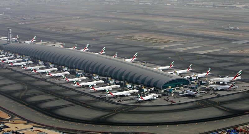 epa06977142 (FILE) - Aircrafts of the Emirates Airlines parking at the Dubai International airport in the Gulf emirate of Dubai, United Arab Emirates, 27 May 2012  (reissued 27 August 2018). The United Arab Emirates General Authority of Civil Aviation on 27 August 2018 denied reports that UAE air traffic was disrupted after an alleged Houthi drone attack. Iran- and Houthi-affiliated media reported claims that Houthi militias from Yemen had carried out a drone attack on Dubai airport.  EPA/ALI HAIDER
