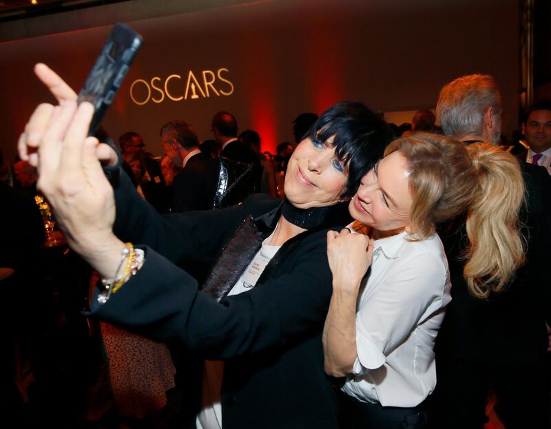 Diane Warren and Renee Zellweger take a selfie. AP