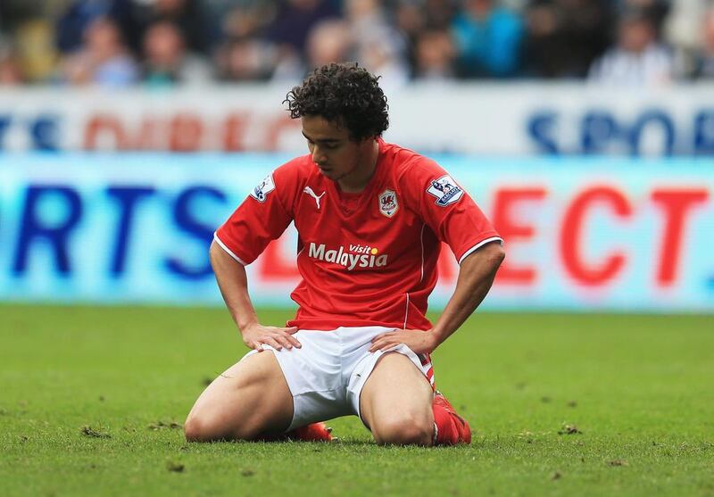 Fabio da Silva of Cardiff City looks dejected after the English Premier League match against Newcastle United. Cardiff lost which ensured their relegation to the Championship. Matthew Lewis / Getty Images