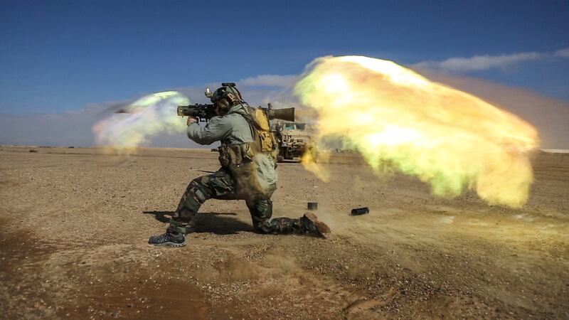 A coalition forces member fires a Carl Gustav recoilless rifle system during weapons practice on a range in Helmand province, Afghanistan, in 2013. US Army Photo