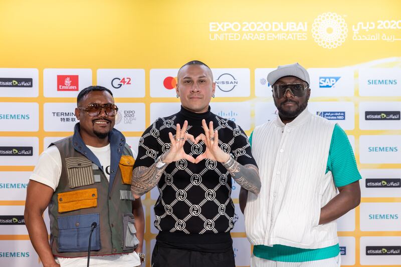 Pop-rap group Black Eyed Peas have arrived at Expo 2020 Dubai to play a concert at Al Wasl Plaza on Tuesday. Members, from left,  apl.de.ap, Taboo and will.i.am are pictured at the Expo Media Centre. Photo: Expo 2020 Dubai