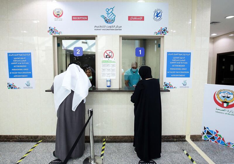 Kuwaitis arrive to get the Covid-19 vaccine at Al Masayel new vaccination centre in Kuwait City. Yasser Al Zayyat / AFP