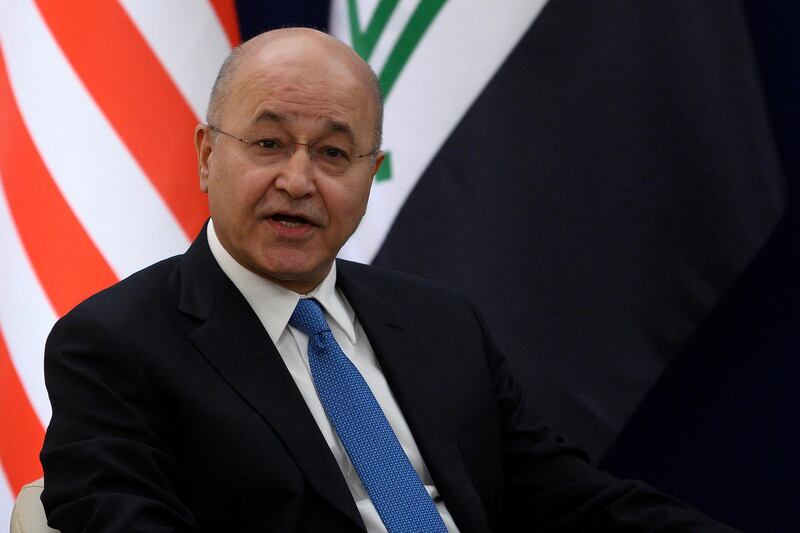 Iraqi President Barham Salih gestures during a bilateral meeting with US President Donald Trump at the World Economic Forum in Davos, Switzerland, on January 22, 2020. (Photo by JIM WATSON / AFP)