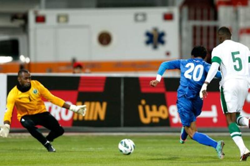 Kuwait's Yousef Al-Sulaiman scores the winning goal against Saudi Arabia in their Gulf Cup clash.