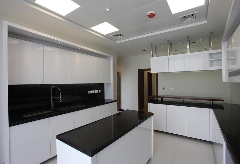 The kitchen in the 64th floor penthouse of Aldar's Gate Towers development. Photo by Clint McLean for The National