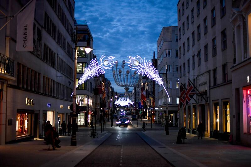 Christmas lights are lit up on New Bond Street in Mayfair, London. AP Photo