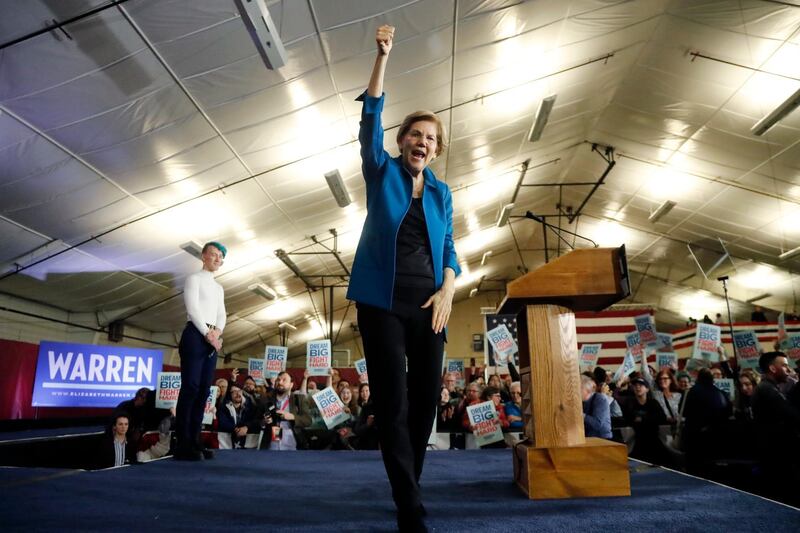 Democratic presidential candidate Sen. Elizabeth Warren, D-Mass., aknowledges supporters at a primary election night rally in Manchester, N.H. AP Photo