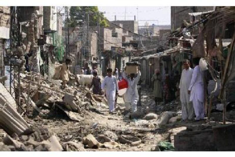 A view of the flood-damaged village of Ghouspur, southern Pakistan. The Pakistani government had hoped that global sympathy for the flood victims would persuade its creditors to either lend it more money, or reschedule payments on its foreign debt.