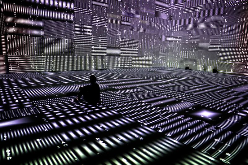 A man watches an audio-visual art installation titled .bug at The Future of Today Exhibition at Today Art Museum in Beijing. Andy Wong / AP photo