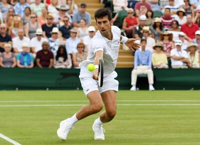 epa06865897 Novak Djokovic of Serbia returns to Horacio Zeballos of Argentina during their second round match at the Wimbledon Championships at the All England Lawn Tennis Club, in London, Britain, 05 July 2018.  EPA/GERRY PENNY EDITORIAL USE ONLY/NO COMMERCIAL SALES