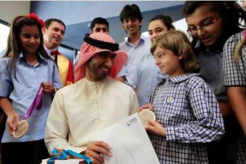 Mohammed Al Hammadi told the pupils of his training programme, which involves waking up at 4am every day to race 21 kilometres.