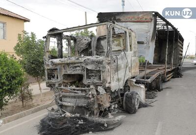 A burnt lorry in the streets of Nukus after protests broke out in the city on July 1.  KUN. UZ via Reuters