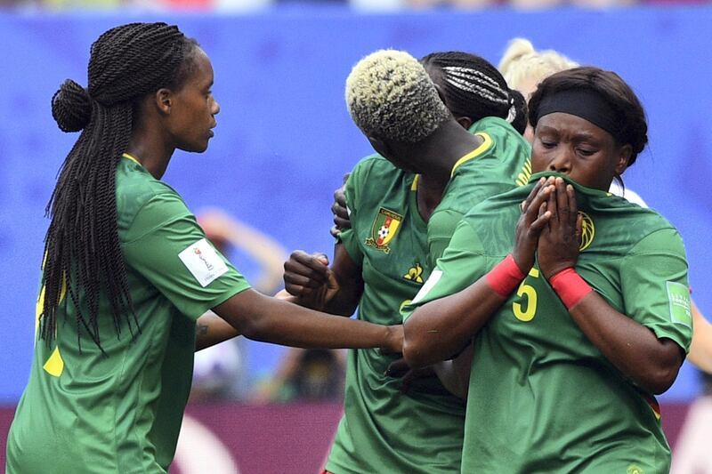 Cameroon's players react after their goal was disallowed for offside during the France 2019 Women's World Cup round of sixteen football match between England and Cameroon, on June 23, 2019, at the Hainaut stadium in Valenciennes, northern France. (Photo by Philippe HUGUEN / AFP)