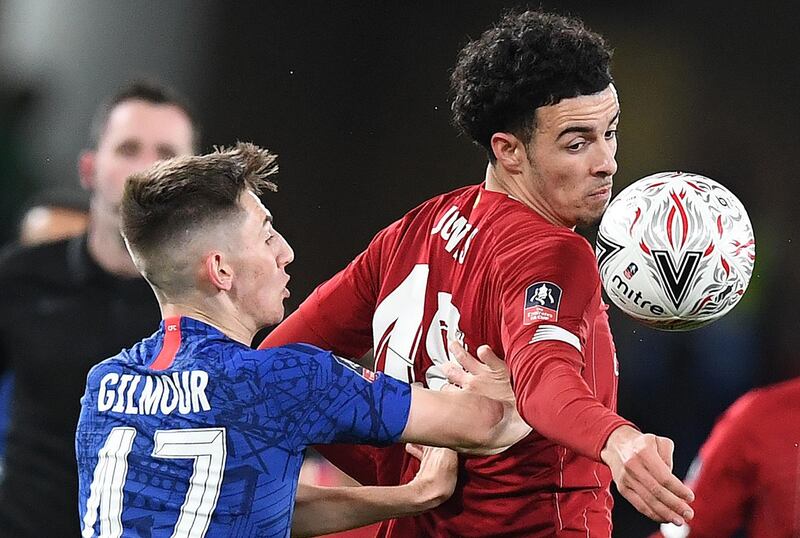 Chelsea midfielder Billy Gilmour in action against Liverpool's Curtis Jones. right. AFP