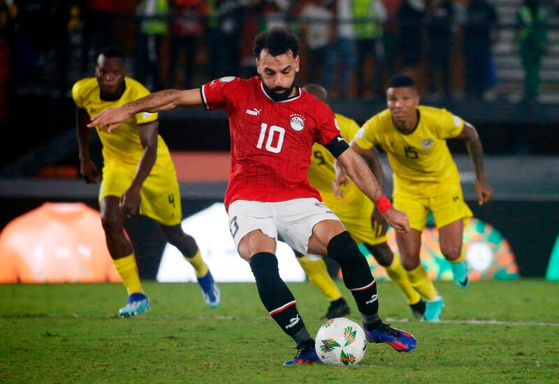 Egypt's Mohamed Salah scores their second goal from the penalty spot deep into injury time to claim a 2-2 draw against Mozambique. AFP
