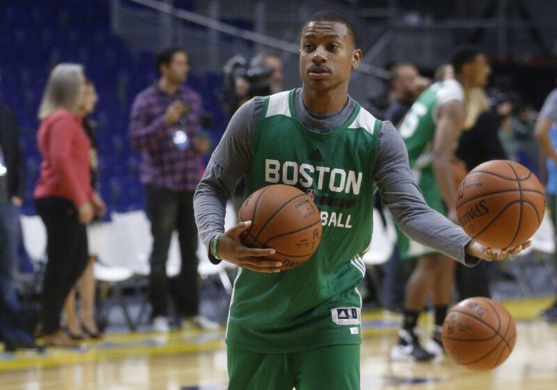 Boston Celtics player Isaiah Thomas takes part in the team’s warm ups on Thursday night before they played Real Madrid in a pre-season match. Javier Lizon / EPA