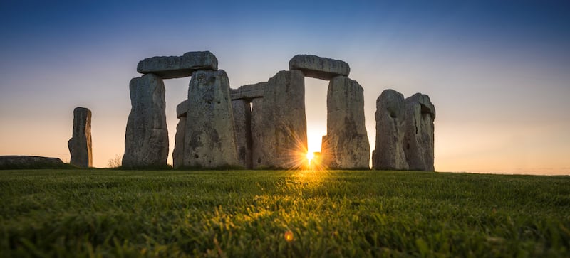 General view of the Stonehenge stone circle during the sunset, near Amesbury, Britain, as seen in this undated image provided to Reuters on July 29, 2020. English Heritage/A.Pattenden/Handout via REUTERS   ATTENTION EDITORS - THIS IMAGE HAS BEEN SUPPLIED BY A THIRD PARTY.
