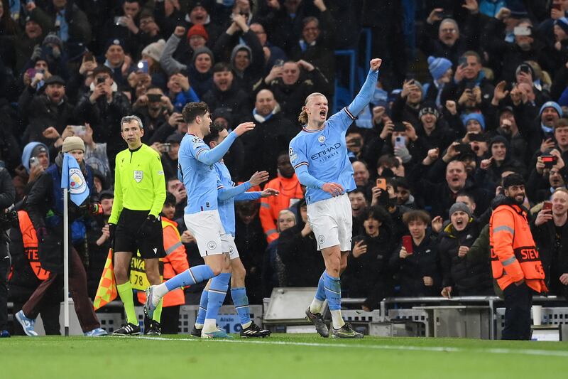 Erling Haaland celebrates after scoring City's first goal from the penalty spot. Getty