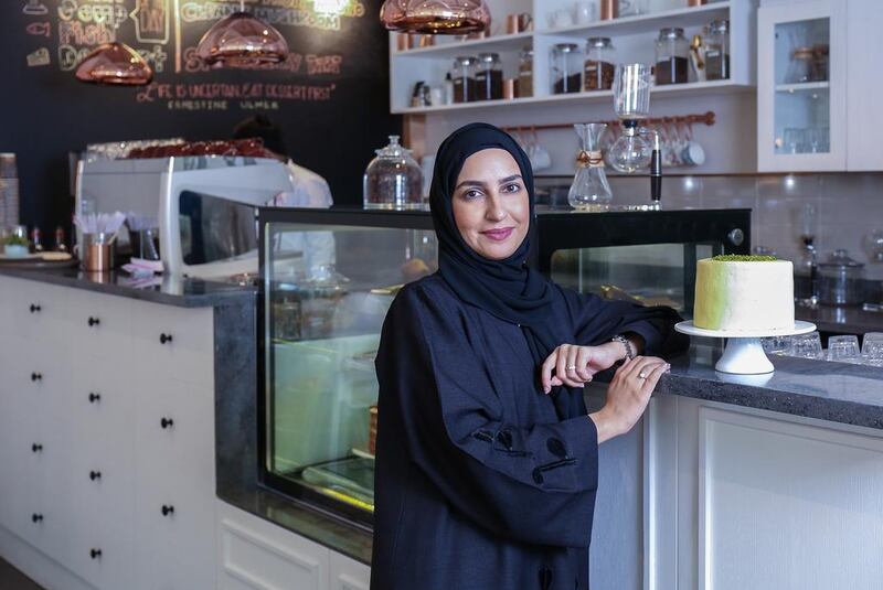 Amna Al Hashemi with her Arabic sponge cake she calls ‘Happily Ever After’. Victor Besa for The National