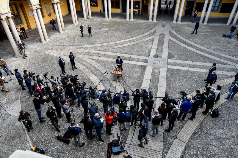 Italian Premier Giuseppe Conte meets reporters in Milan, Italy. Italian factories, construction sites and wholesale supply businesses can resume activity as soon as they put safety measures into place aimed at containing contagion with COVID-19. This concession comes with partial easing of national lockdown restrictions announced Sunday night by Italian Premier Giuseppe Conte.  AP