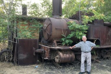 Namroud posing next to a rusting steam train in Riyaq. Photo by Maghie Ghali