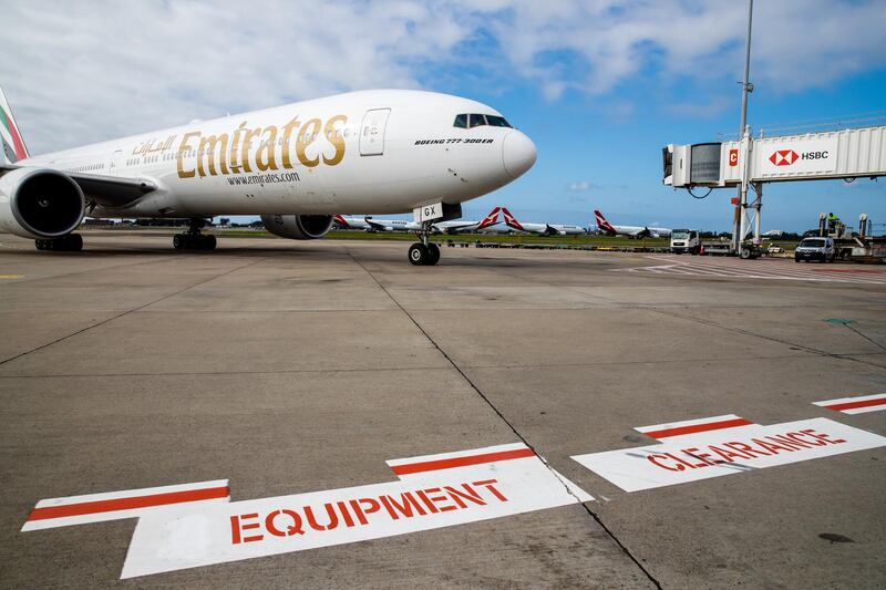 An Emirates plane carrying doses of the Oxford-AstraZeneca vaccine arrives at Sydney International airport. The shipment contained 300,000 doses. Getty