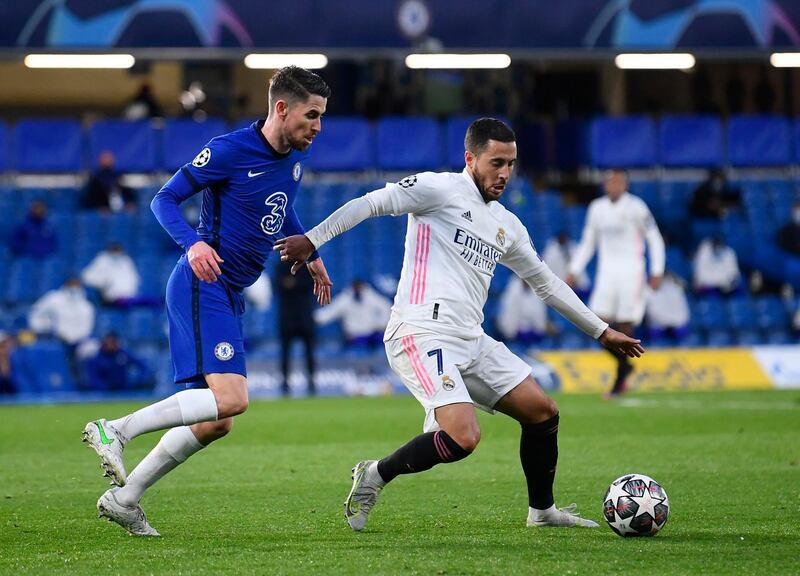 Real Madrid's Eden Hazard battles with Chelsea's Jorginho. Reuters