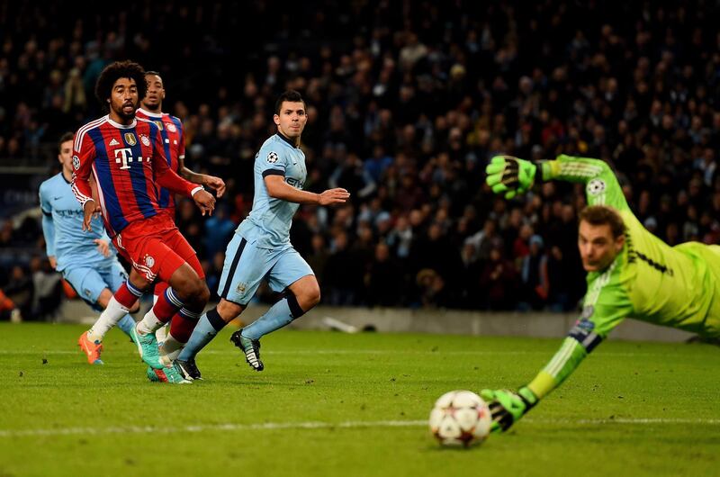 MANCHESTER, ENGLAND - NOVEMBER 25:  Sergio Aguero of Manchester City scores his team's second goal during the UEFA Champions League Group E match between Manchester City and FC Bayern Muenchen at the Etihad Stadium on November 25, 2014 in Manchester, United Kingdom.  (Photo by Laurence Griffiths/Bongarts/Getty Images)