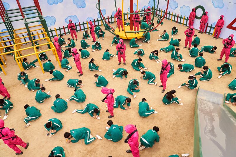 A scene from the Netflix show "Squid Game" where contestants compete to win the Dalgona Korean candy. Youngkyu Park / Netflix via AP