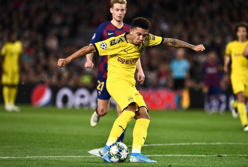 Substitute Jadon Sancho scores a consolation for Dortmund. AFP