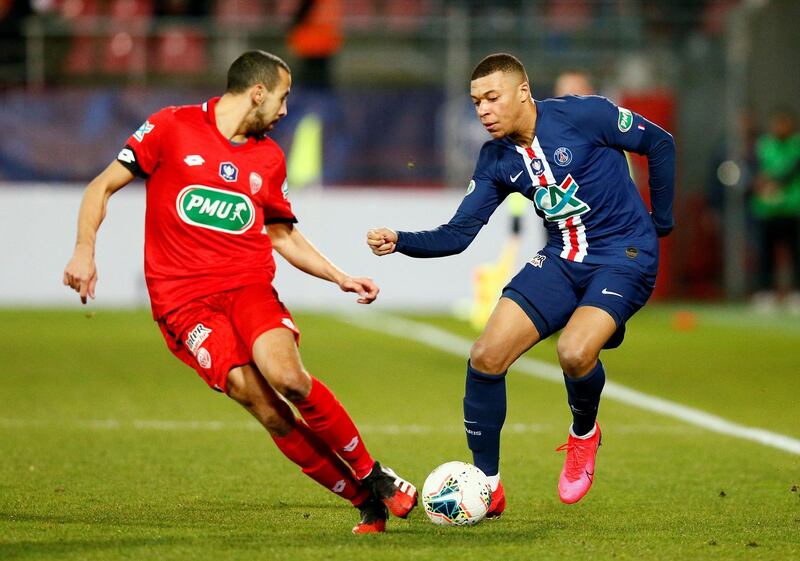Kylian Mbappe, right, on the attack against Dijon. Reuters