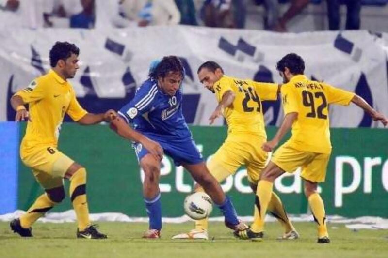 Luca Toni, in blue, will find himself the centre of the Al Nasr attack in their Asian Champions League game against Sepahan.