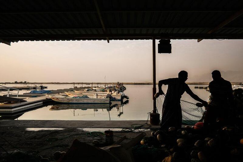 Al Rams maintains its maritime heritage, with fishing boats sailing  
out each day. Local employers often operate several boats, hiring  
Bangladeshi, Indian, Sri Lankan and Pakistani fishermen. Tending the  
nets and preparing the boats for the next day is a constant task.