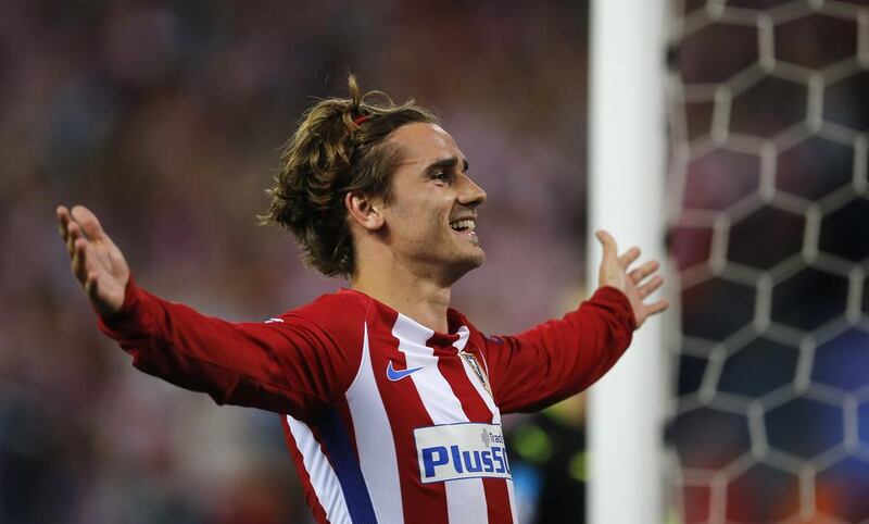 Atletico Madrid's Antoine Griezmann celebrates after scoring against Leicester City in the Uefa Champions League quarter-finals. Paul White / AP file