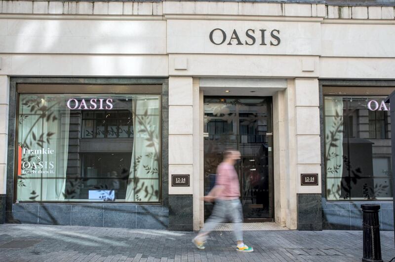 A pedestrian walks past a store of fashion chain Oasis, whose online business and all associated intellectual property have been bought by BooHoo Group Plc, in London, U.K. on Monday, Aug. 24, 2020. Spending by shoppers, drinkers and diners is vital to Britain's effort to emerge from its deepest recession for three centuries. Photographer: Jason Alden/Bloomberg