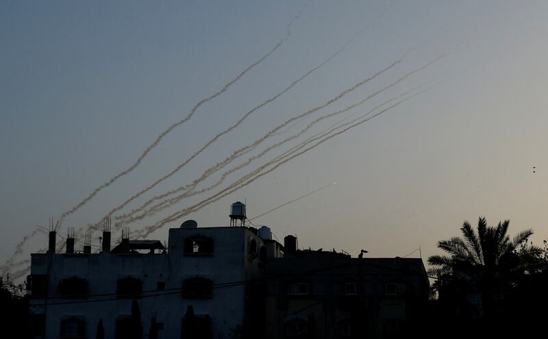 Trails of smoke is seen as rockets are fired from Gaza. Reuters