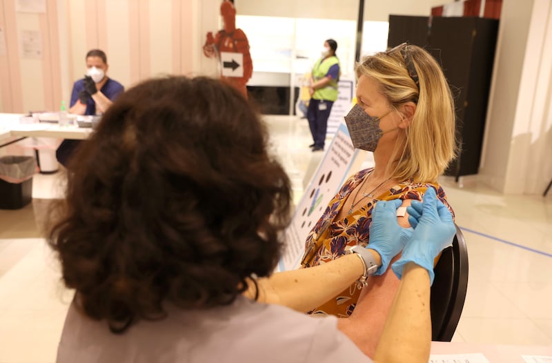 A nurse administers a Covid-19 booster vaccination at a clinic in San Rafael, California. AFP