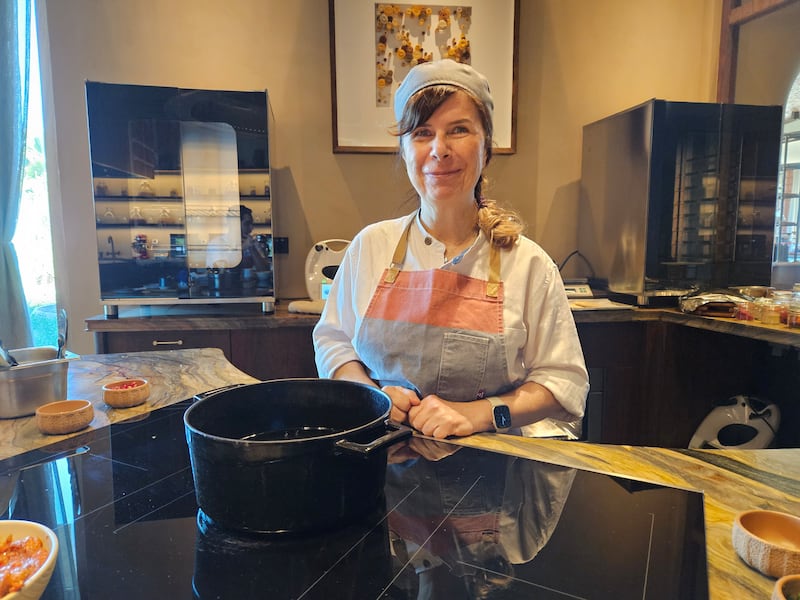 The resort's plant-based chef Ayse Aktan conducts cooking lessons at Merkaz restaurant. Katy Gillett / The National