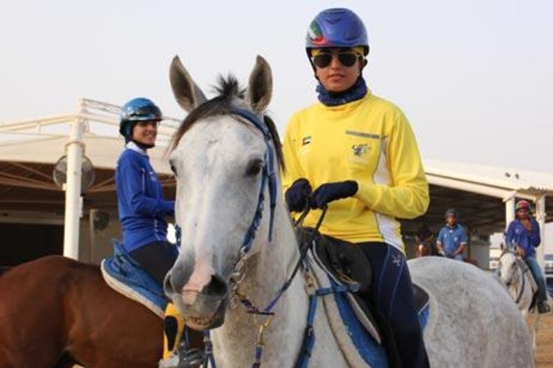Fatma al Marri, right, and Shathra al Hajjaj were the first Emirati women jockeys to race on the flat, at the Duindigt Racecourse in Holland.