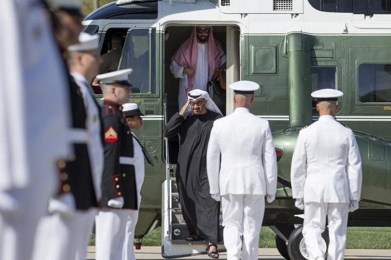 Sheikh Mohammed bin Zayed salutes US military personnel on his arrival at Camp David. Ryan Carter / Crown Prince Court - Abu Dhabi / May 14, 2015