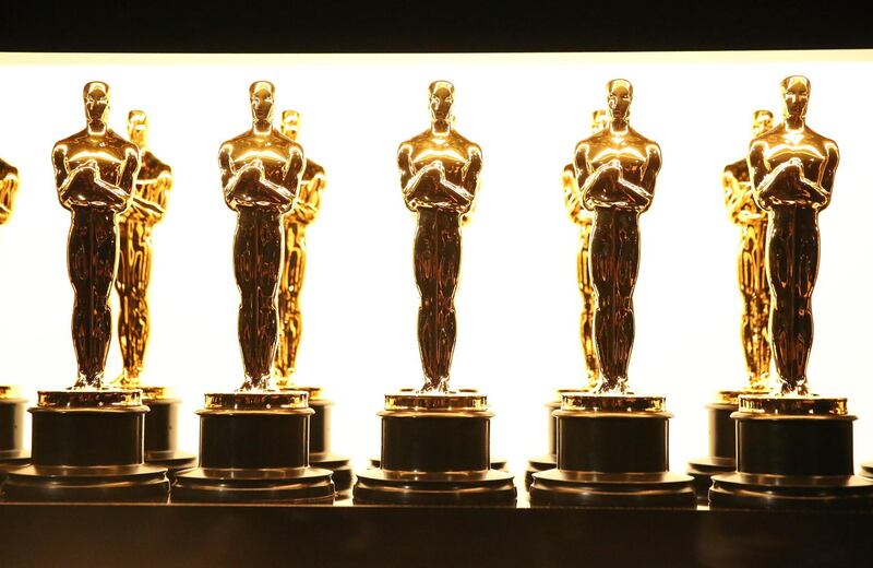 FILE - In this Feb. 26, 2017 file photo, Oscar statuettes appear backstage at the Oscars in Los Angeles. Show producers Steven Soderbergh, Jesse Collins and Stacey Sher remain determined to have an in-person ceremony on April 25 in Los Angeles but told nominees Tuesday in a virtual meeting that theyâ€™ve added a UK hub after some backlash from nominees about international travel restrictions. (Photo by Matt Sayles/Invision/AP, File)
