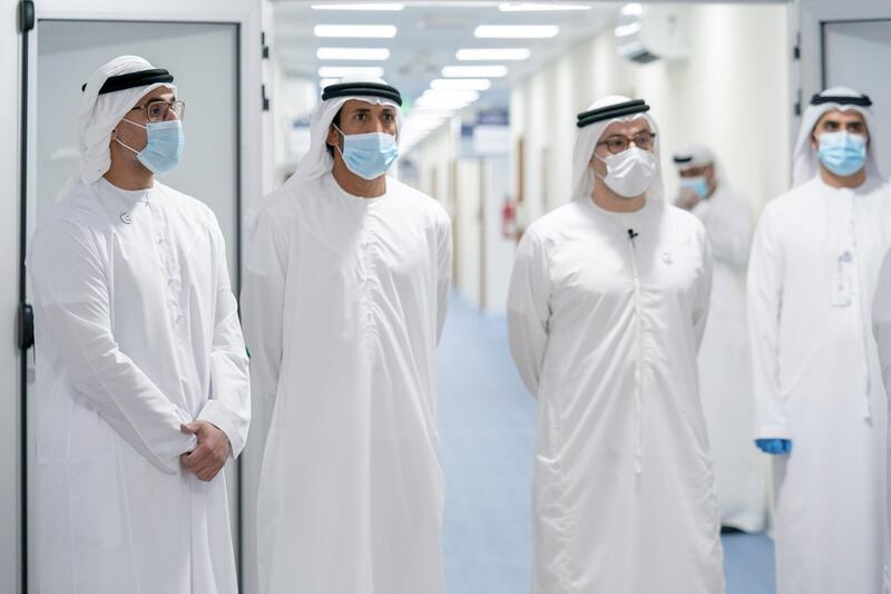 ABU DHABI, UNITED ARAB EMIRATES - May 18, 2020: HH Major General Sheikh Khaled bin Mohamed bin Zayed Al Nahyan, Deputy National Security Adviser, member of the Abu Dhabi Executive Council and Chairman of Abu Dhabi Executive Office (L) visits Emirates Field Hospital, at Emirates Humanitarian City. Seen with HE Mohamed Mubarak Al Mazrouei, Undersecretary of the Crown Prince Court of Abu Dhabi (2nd L) and Salem Rashid Al Noaimi, Chairman of Abu Dhabi Health Services Company (SEHA) (3rd L).


( Hamad Al Mansoori for the Ministry of Presidential Affairs )​
---