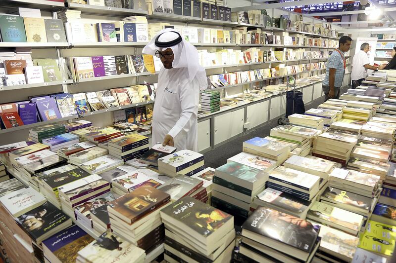 Sharjah, 03, Nov, 2017: Visitor take a look at the books during the Sharjah International Book Fair at the Sharjah Expo Centre in Sharjah. Satish Kumar for the National / Story by Saeed Saeed