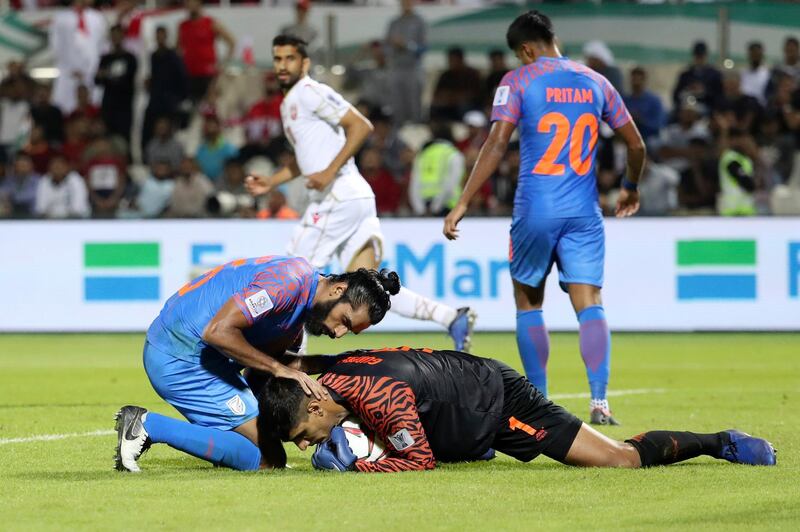 Jhingan protects goalkeeper Gurpreet Singh Sandhu. AFP
