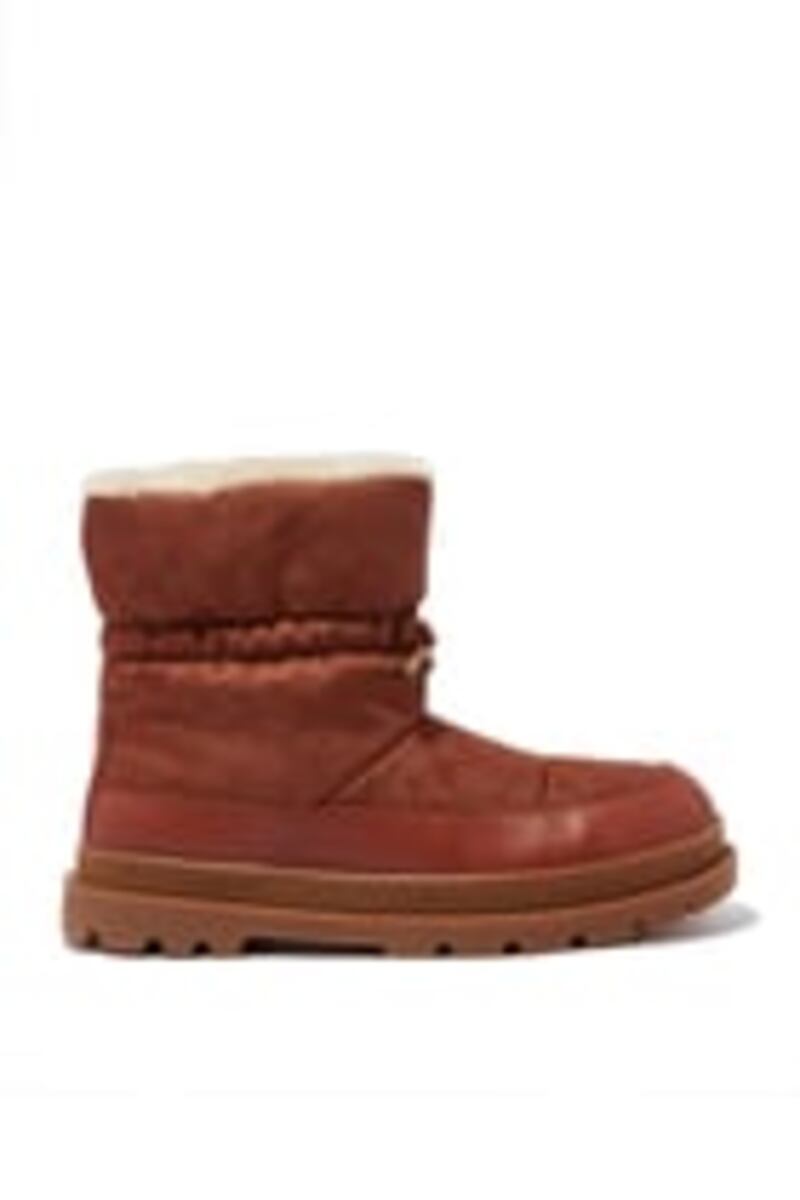 Ugg-style boots: Kailee boots, Dh1,800, Coach at Bloomingdale's