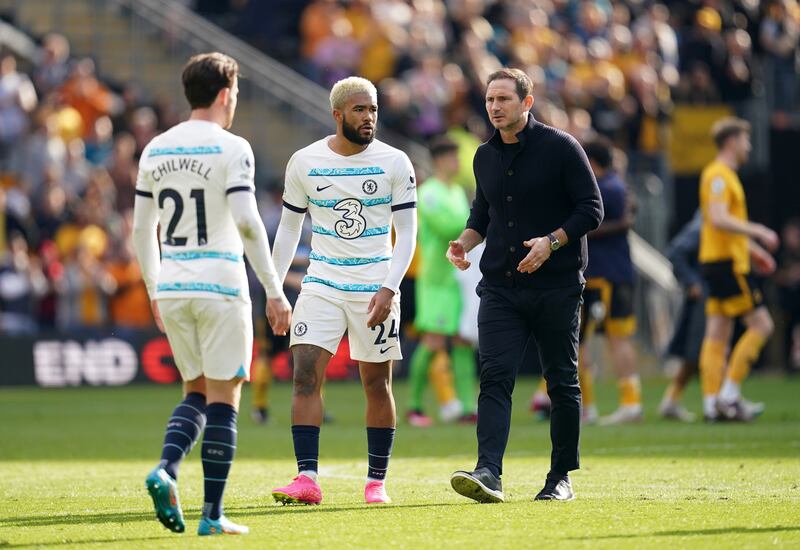Chelsea interim manager Frank Lampard speaks to Ben Chilwell and Reece James after the defeat to Wolves at Molineux Stadium on Saturday April 8, 2023. PA