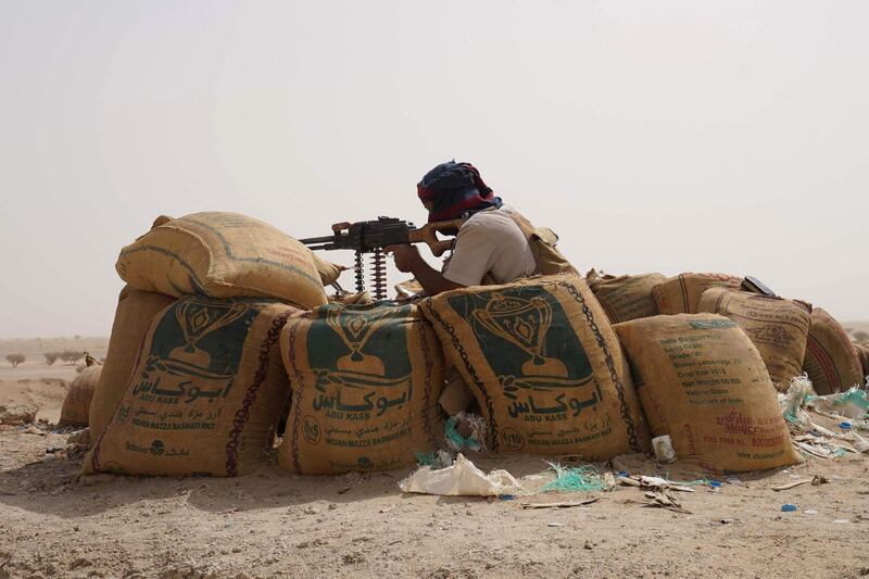 Fighters with forces loyal to Yemen's internationally recognised government hold a position against Houthi rebels in Yemen's northeastern province of Marib. AFP