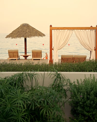 The private beach at Naama Beach Villas & Spa in Al Aqah. Photo: Naama Beach Villas & Spa