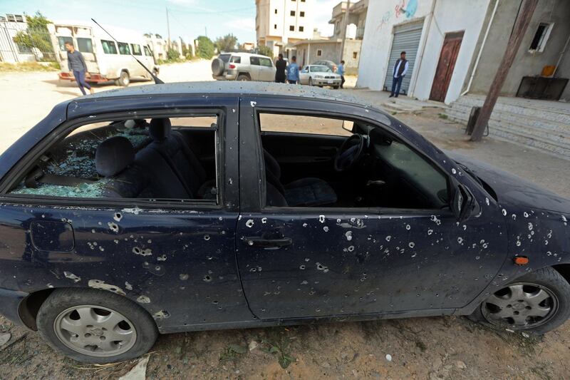 A picture taken on February 12, 2020 shows blood stains inside a victim's car after a shell landed in a residential neighbourhood near Tripoli University in the Libyan capital.  / AFP / Mahmud TURKIA
